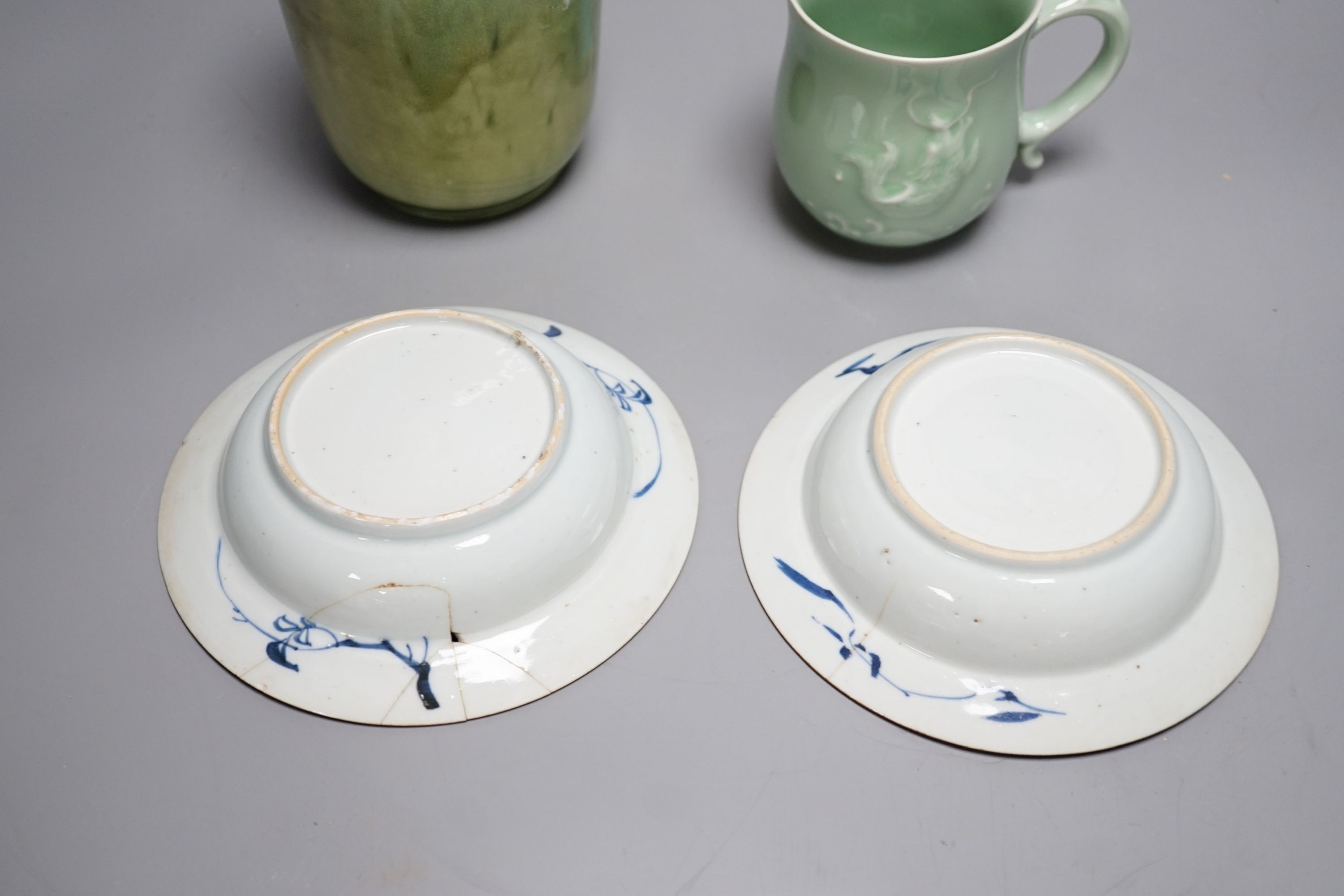 Two Chinese blue and white export dishes, a celadon cup and green glazed pottery vase, Export dishes 16,5 cms diameter.